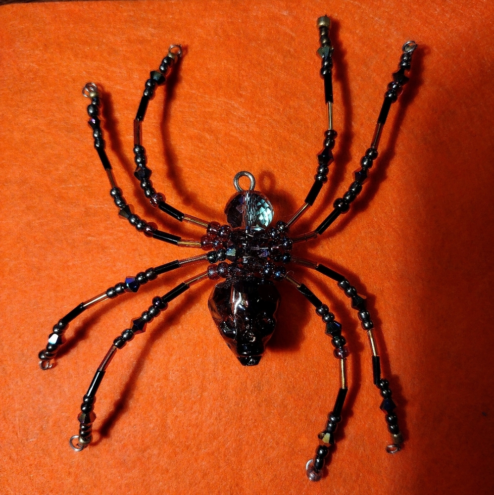 Halloween beaded spider with a skull for the body.